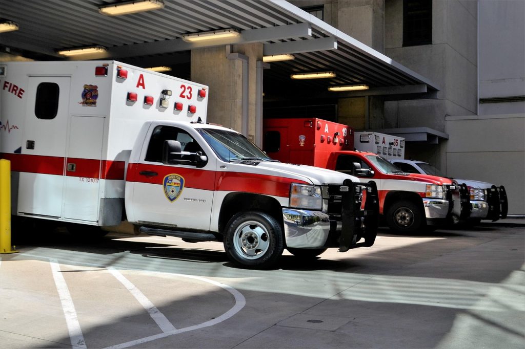 parked ambulances in parking garage